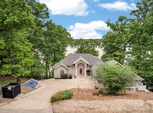 446 Crown Point Dr, Village Of Four Seasons, MO 65049