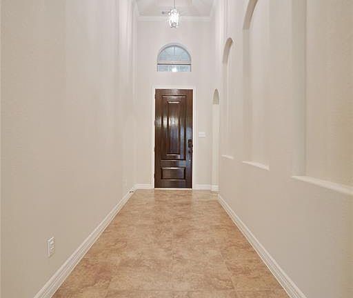 Notice the incredible detail in this home starting with these beautiful wall nitches along the hallway