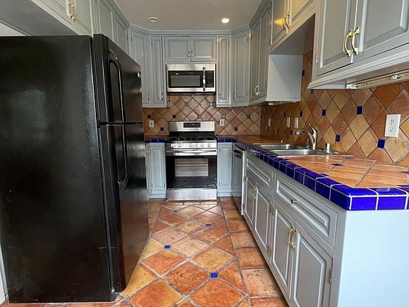 Great Kitchen with refrigerator, oven, and dishwasher included.