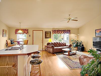 Great room concept with high celings capturing an abundance of natural light. 