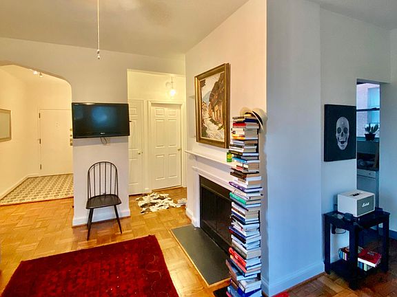 Wood burning fireplace. Mounted TV stays with the unit.