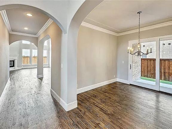 Extended entry view with dining room