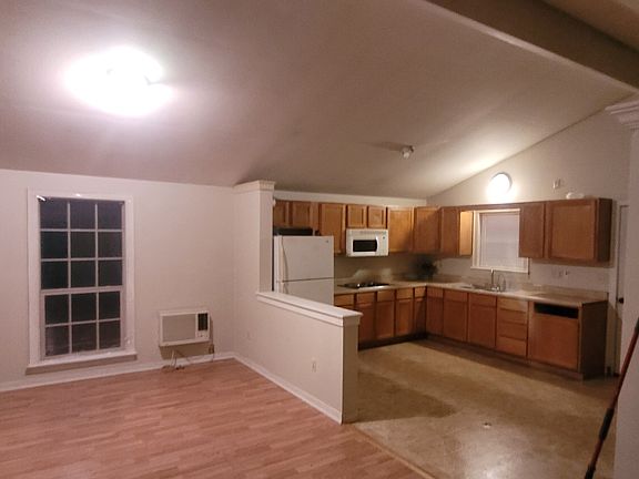 living room & kitchen areas. the cabin is all open floorplan except the bathroom \ laundry room are encased with walls