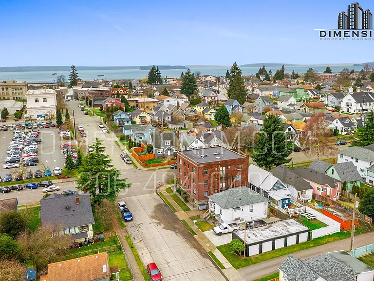 Historic Brick Studios in Walkable North Everett Updated Kitchens, Natural Light & Select Views — Photo 10