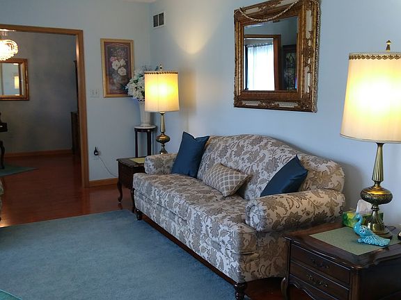 Living Room w/ bow window.