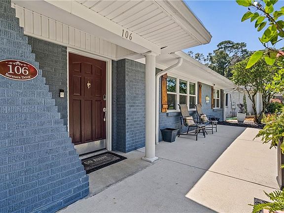 Dining space with crown molding, light wood-style floors, and a ceiling fan