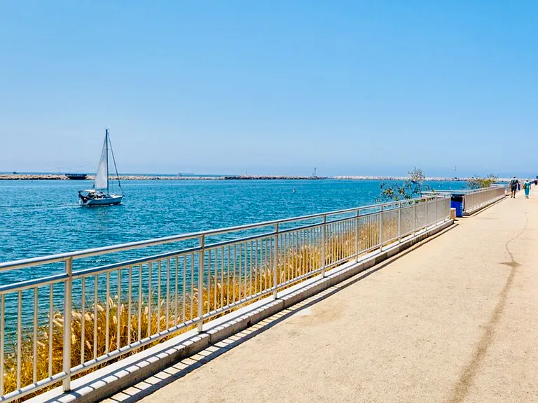 This is the Marina Del Rey walkway along the sailing channel, a one minute walk away