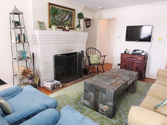 With Flat Screen TV and fireplace