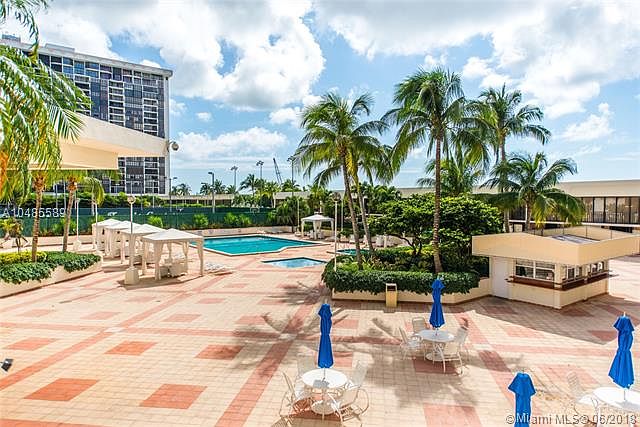 Light filled condo on Brickell with partial bay views, open living spaces & a large covered balcony.