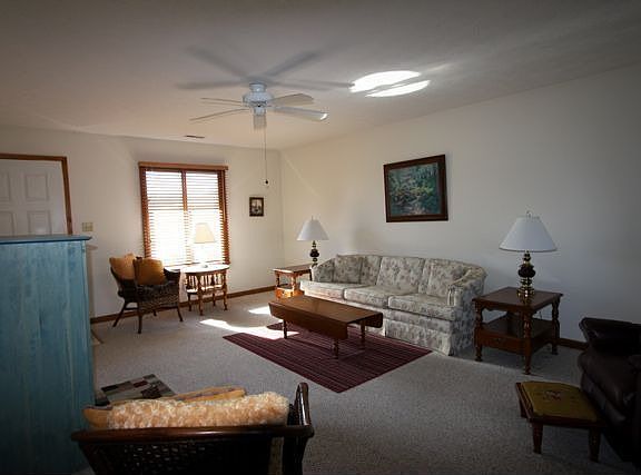 From Hallway by Bedrooms to Living Room