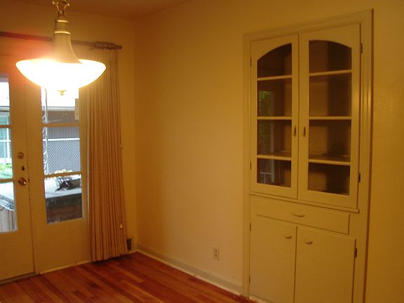 Dining room...lots of nice buil-ins/large door to patio