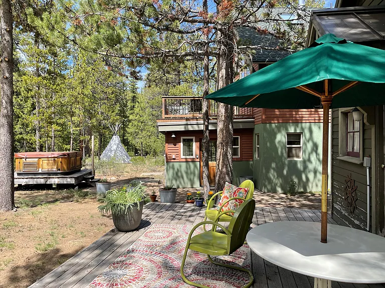 Hot tub on the creekside of property