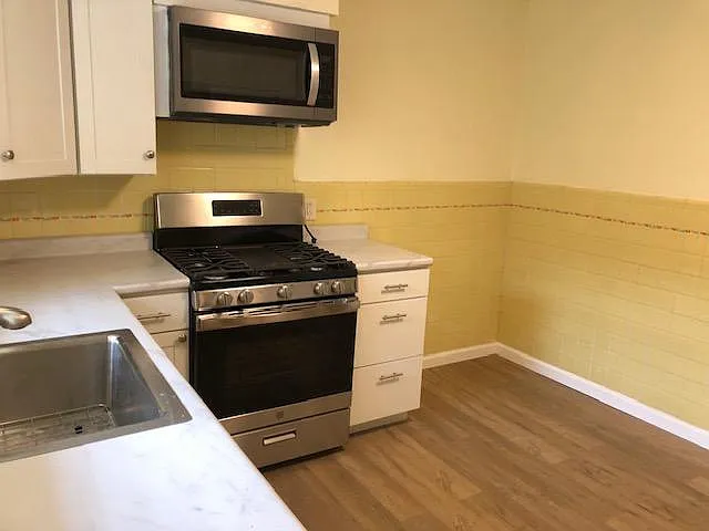 Original tile with space for small table.