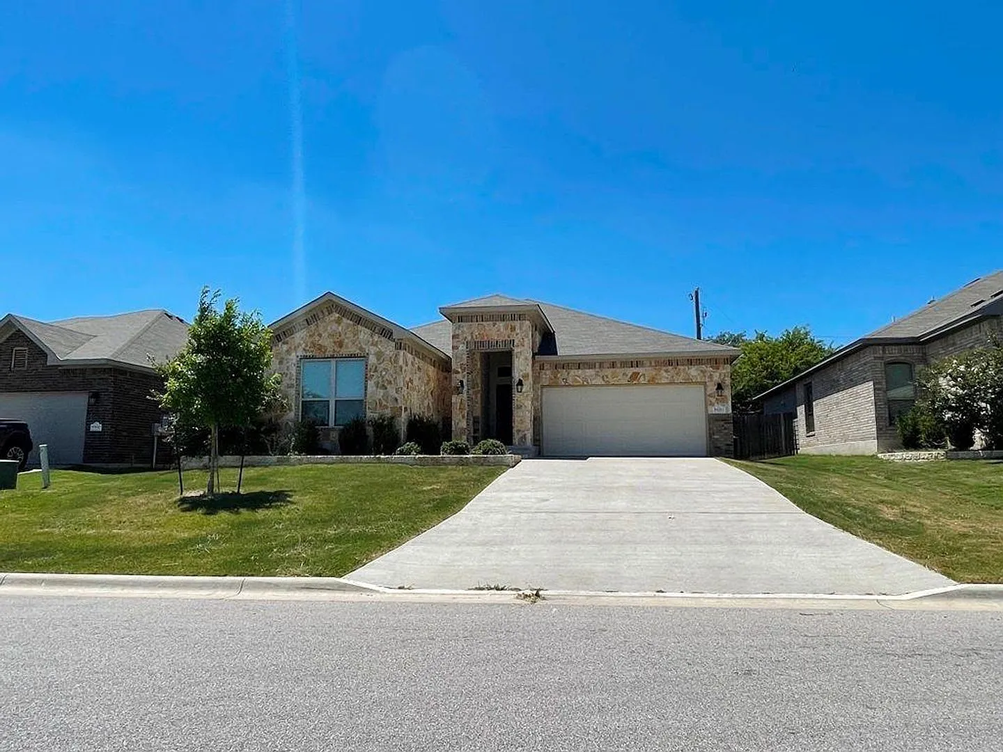 Discover comfort, space, and everyday convenience at 5820 Blackstone Drive! — Photo 1