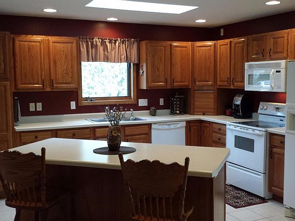 Lots of glowing cabinets & skylight