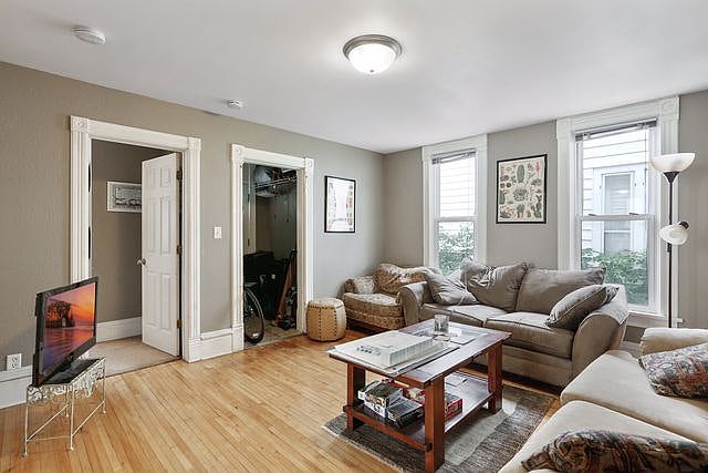 Front Bedroom (Left Door) / Entry (Right Doorway) / Living Room