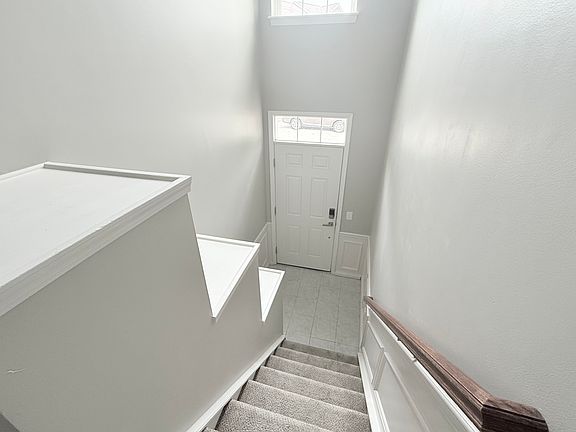 The entrance is bright and inviting -with modern keypad access