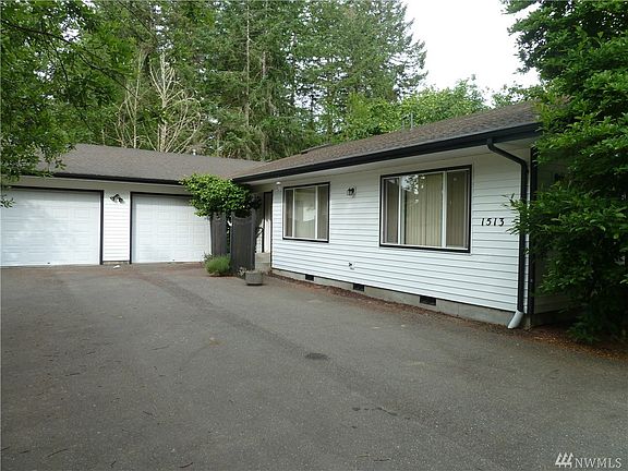 HUGE kitchen. Space for a full-sized table in the center and cabinets and counterspace galore!