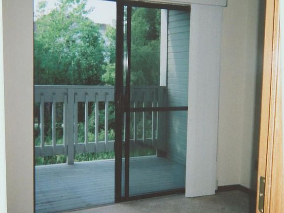 Bedroom w/deck and greenspace