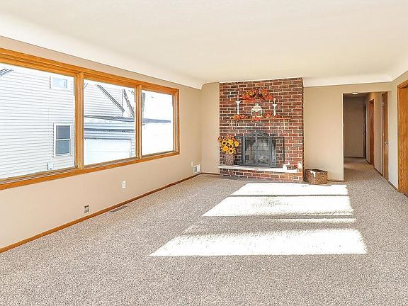 Fireplace with custom mantel and brick surround
