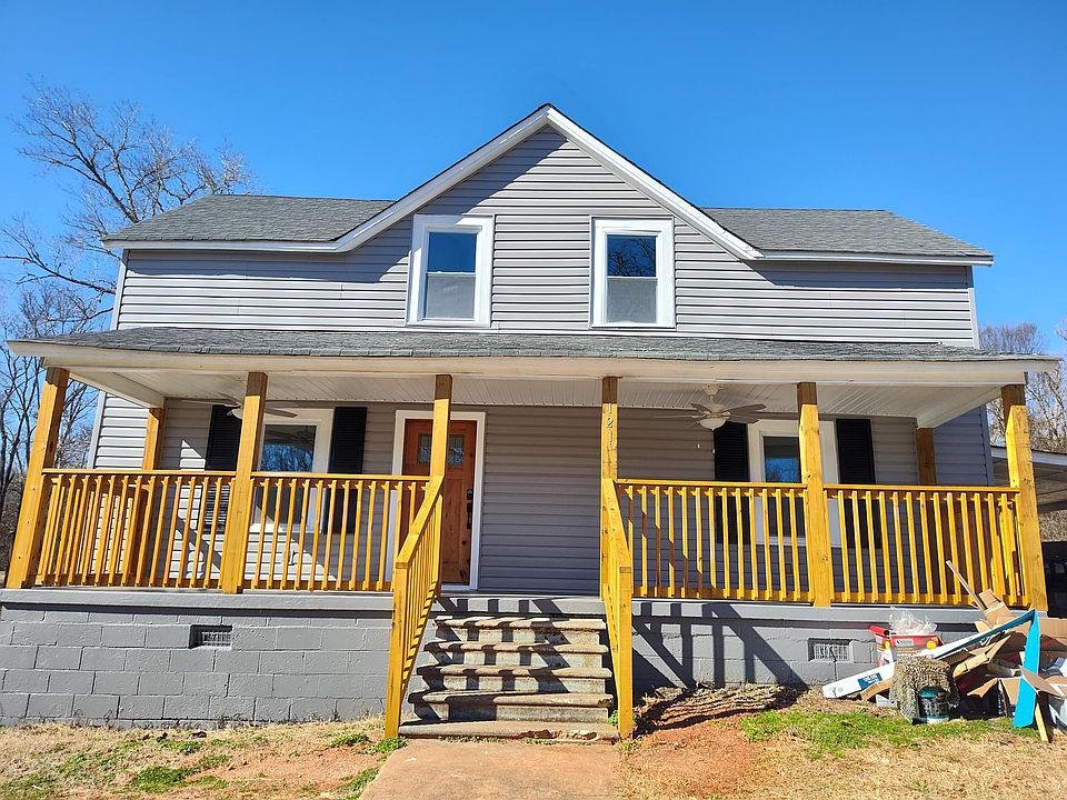 Front view with a rocking chair porch.