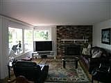 Light and bright main floor living room with plenty of daylight.
