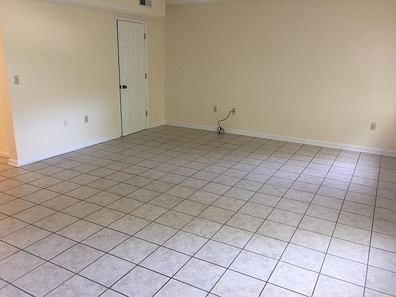 Living Room with access to outdoor patio