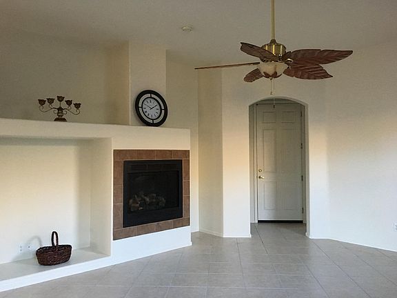 Open Living room with gas fireplace.