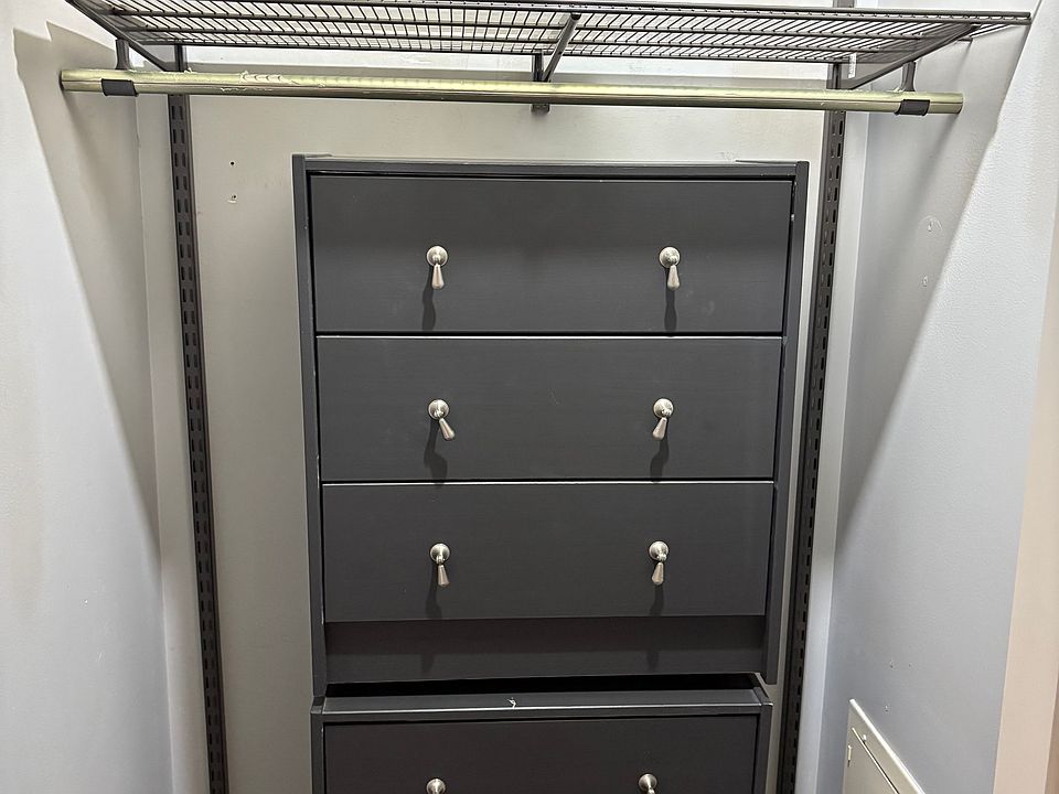 Organized front closet, storage to ceiling
