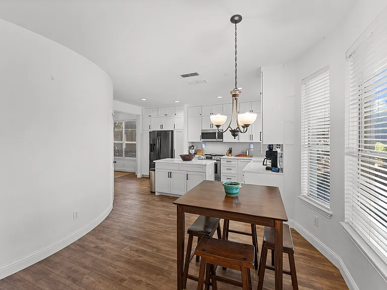 A bright, cozy corner perfect for morning coffee or casual bites.