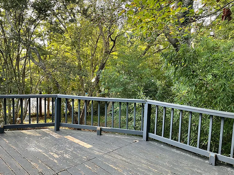 Deck Overlooking fenced yard
