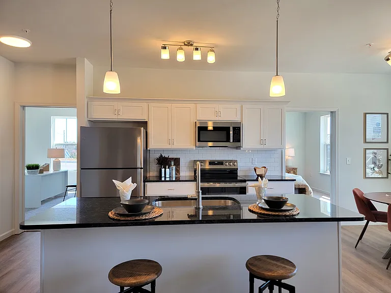 Legacy Floor Plan - Kitchen with Stainless Steel Appliances and Granite Countertops