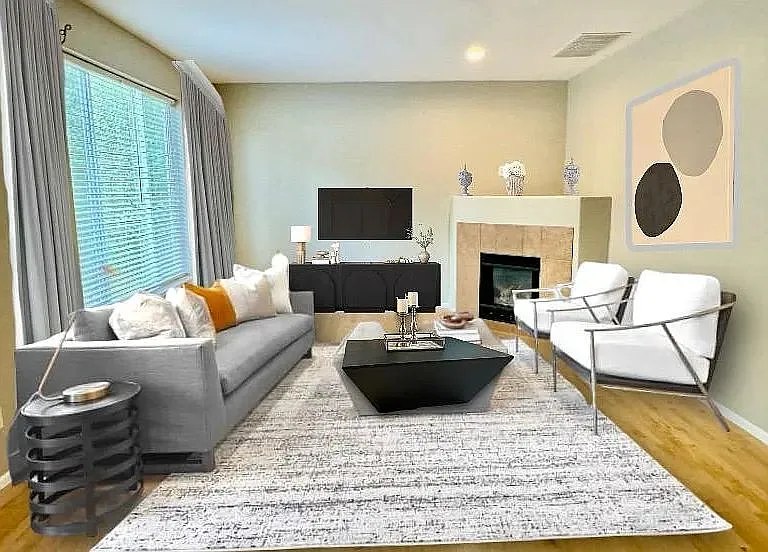 Large TV room/family room directly accross the kitchen, great spot for family entertainment. Open floor plan. ( furniture is digitally added to show potential )