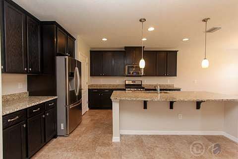 Kitchen with Granite and Stainless Steel