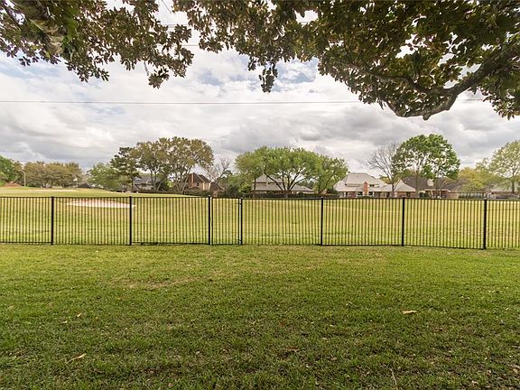 Plenty of room beyond the pool area for people and pets