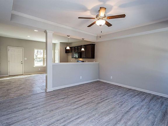 Large living room with hardwood, open floor plan