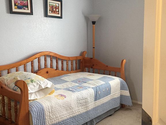 One of the two identical bedrooms