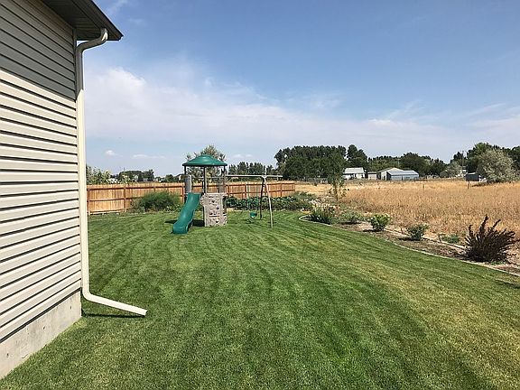 Empty field behind home