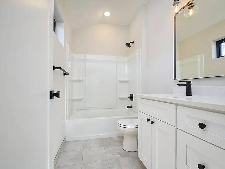 Full bathroom attached to Primary Bedroom