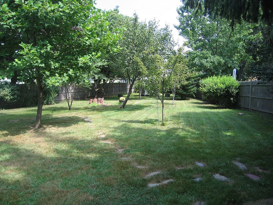 Spacious .32 acre corner lot with fruit trees and gazebo!