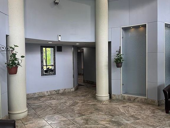 3rd image of 10899 University Dr #404