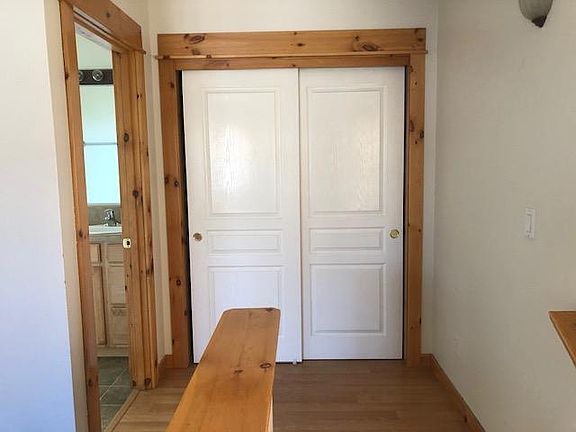 Convenient storage/linen closet at the top of stairs