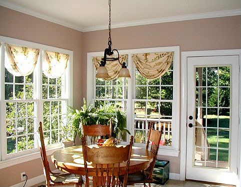 Light Filled Breakfast Room w door to porch.