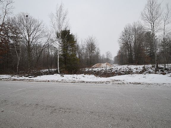 View from the road showing the sand that was left over after building the road base.