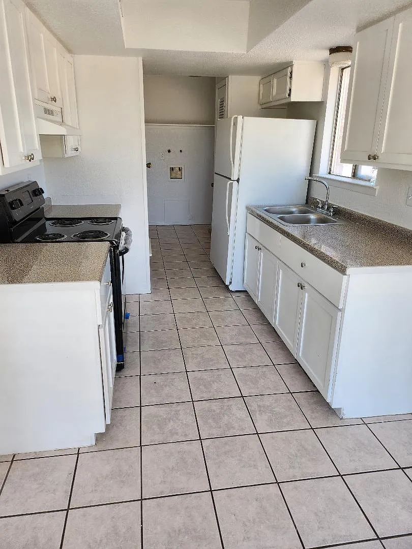Kitchen (laundry room at the end) - 1920 Amy Sue Dr