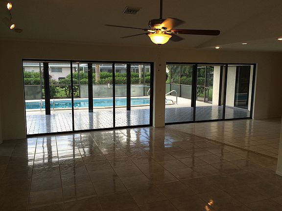 Two 3 panel pocketing Sliders in Living Room