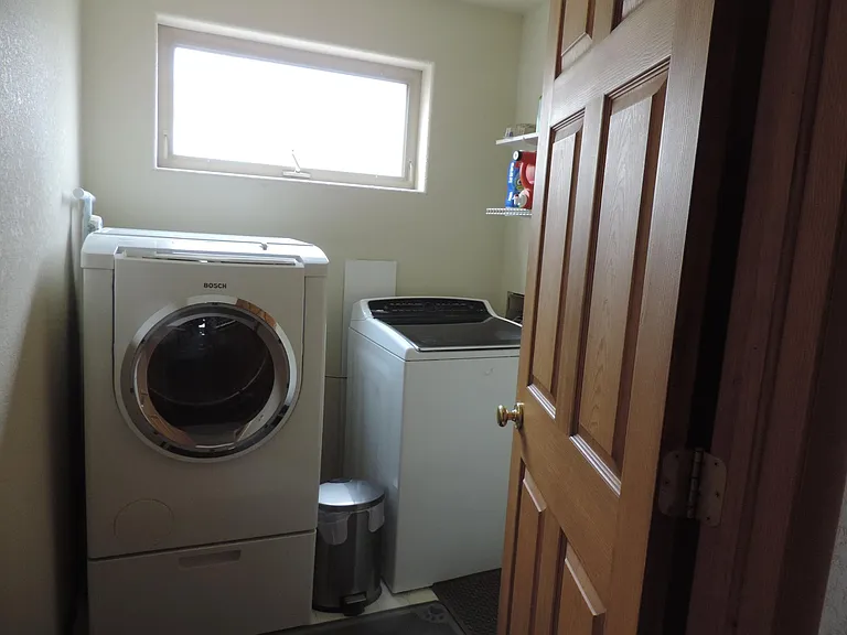 Upstairs laundry room.
