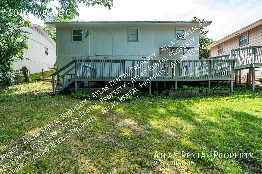 Spacious & Renovated 3-Bedroom Home with Finished Basement & Large Deck! — Photo 4