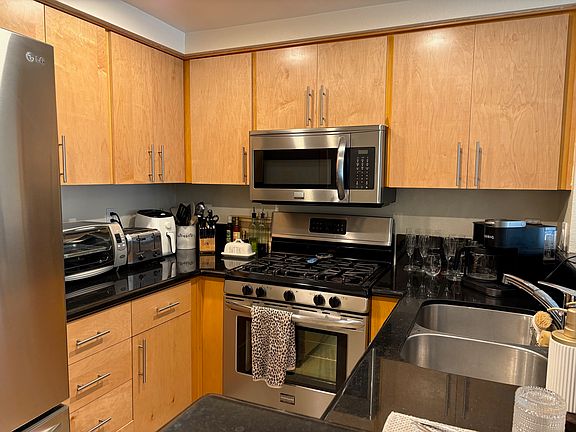 Kitchen with stainless steel appliances.