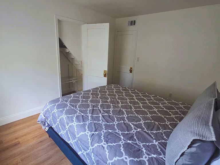 Roomy closet for storing clothes, luggage, and everyday essentials.